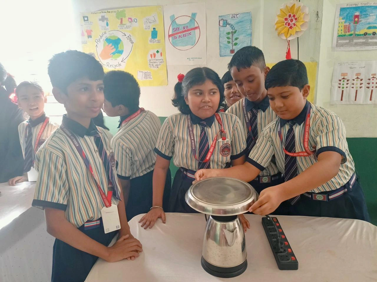 Children participating in classroom learning