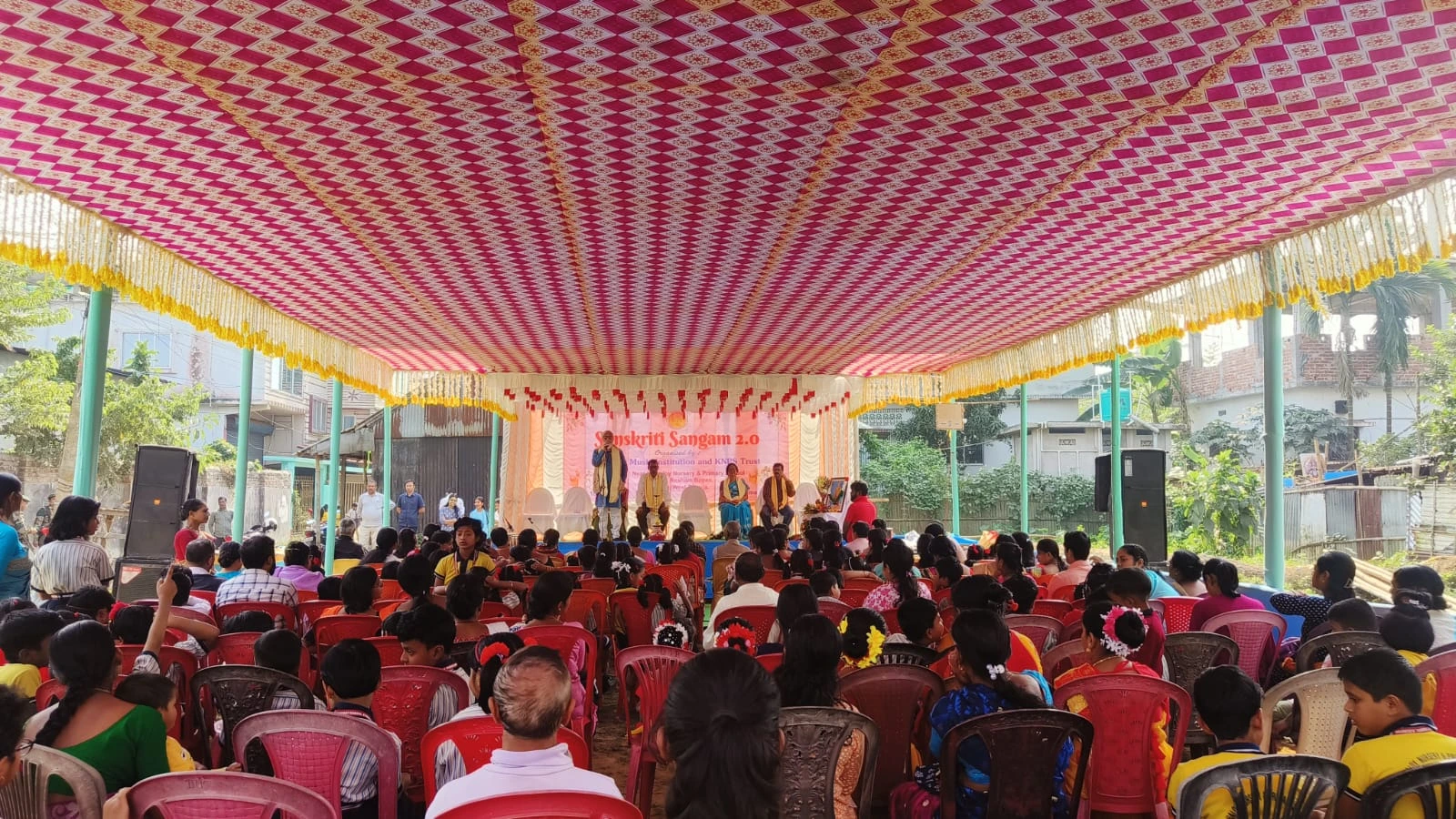 Students on stage during cultural activity